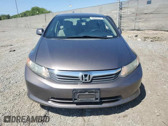 2012 Honda Civic LX z VIN 2HGFB2F5XCH517276, wystawiony jako Copart lot #59443775 z przebiegiem 98 749 mil mil oraz Szkoda całkowita • Salvage title. Historia ofert i sprzedaży dostępna na DreamBid. Obrazek 5.