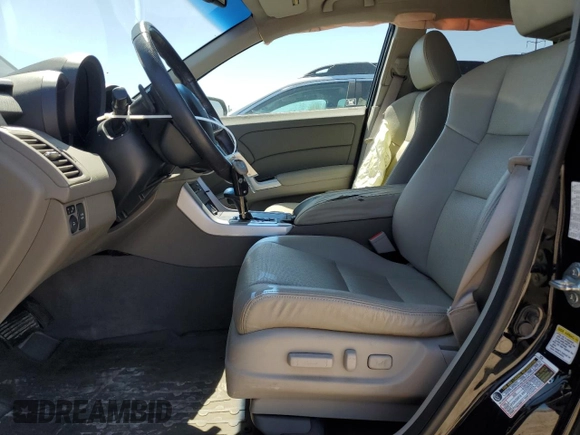 2009 Acura RDX z VIN 5J8TB18239A002305, wystawiony jako Copart lot #54898075 z przebiegiem 75 378 mil mil oraz Szkoda całkowita • Salvage title. Historia ofert i sprzedaży dostępna na DreamBid. Obrazek 7.
