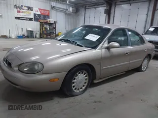 1999 Mercury Sable LS Premium Group with VIN 1MEFM53S2XG611480, listed as a IAAI auction lot 42194022 with 144,955 mi miles and . Bid and sale history available at DreamBid. Image 2.