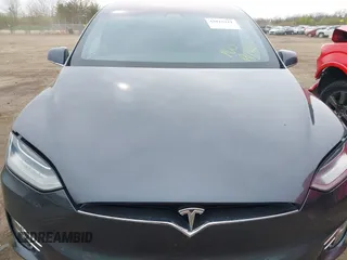 2019 Tesla Model X 75D with VIN 5YJXCDE24KF152150, listed as a IAAI auction lot 42015311 with 1 mi miles. Bid and sale history available at carsss.com. Image 10.