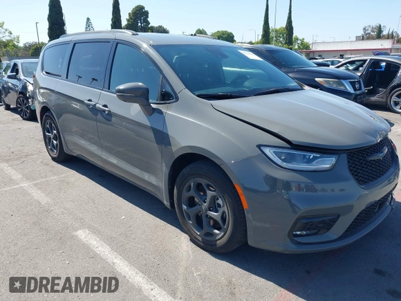 2021 Chrysler Pacifica Hybrid Limited z VIN 2C4RC1S76MR544495, wystawiony jako IAAI lot #42294312 z przebiegiem 89 083 mil mil oraz . Historia ofert i sprzedaży dostępna na DreamBid. Obrazek 1.