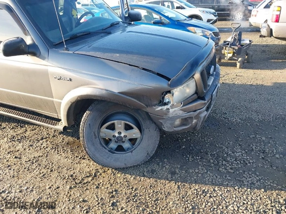 2004 Ford Ranger XLT with VIN 1FTZR45E94PB01043, listed as a IAAI auction lot 41390990 with 169422 miles. Bid and sale history available at carsss.com. Image 6.