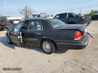 1999 Ford Crown Victoria LX with VIN 2FAFP74WXXX235990, listed as a Copart auction lot 69134854 with 174,636 mi miles and Non Repairable. Bid and sale history available at carsss.com. Image 2.