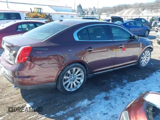 2012 Lincoln MKS with VIN 1LNHL9ER7CG803675, listed as a IAAI auction lot 41622367 with 128,157 mi miles. Bid and sale history available at carsss.com. Image 4.