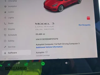 2021 Tesla Model 3 Long Range with VIN 5YJ3E1EB2MF015279, listed as a IAAI auction lot 41765428 with 55,486 mi miles. Bid and sale history available at carsss.com. Image 15.