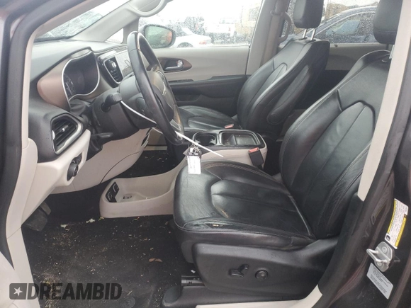 2017 Chrysler Pacifica Touring L with VIN 2C4RC1BG4HR810277, listed as a Copart auction lot 77885014 with 101,492 mi miles and Salvage Title. Bid and sale history available at DreamBid. Image 7.