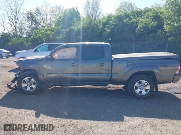 2015 Toyota Tacoma with VIN 3TMMU4FN5FM082376, listed as a IAAI auction lot 42144113 with 98,244 mi miles and . Bid and sale history available at DreamBid. Image 15.