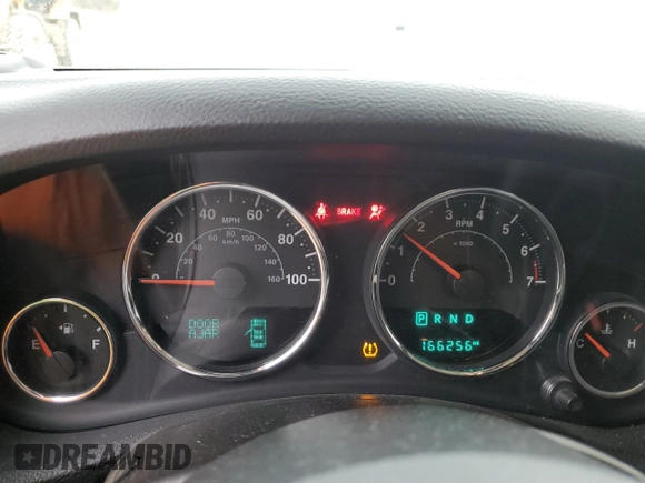2015 Jeep Wrangler Unlimited Willys Wheeler with VIN 1C4BJWDG4FL723924, listed as a Copart auction lot 47145245 with 166,256 mi miles and Salvage Title. Bid and sale history available at DreamBid. Image 9.