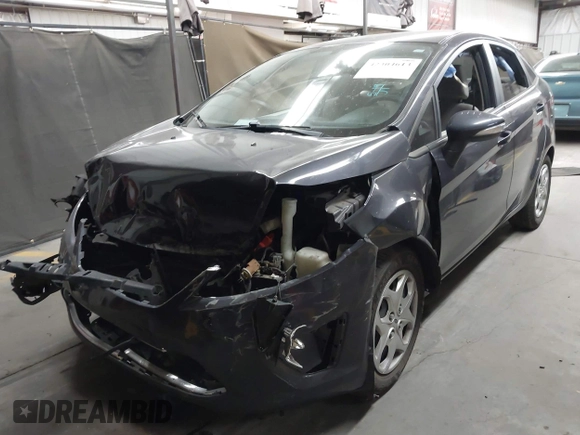 2013 Ford Fiesta SE z VIN 3FADP4BJ1DM186232, wystawiony jako IAAI lot #42304613 z przebiegiem 105 919 mil mil oraz . Historia ofert i sprzedaży dostępna na DreamBid. Obrazek 17.