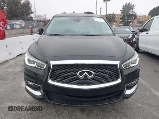 2019 Infiniti QX60 LUXE with VIN 5N1DL0MN7KC500202, listed as a IAAI auction lot 41229623 with 103,626 mi miles. Bid and sale history available at carsss.com. Image 13.