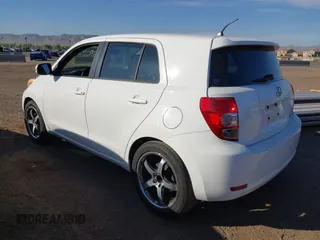 2011 Scion xD with VIN JTKKU4B49B1012447, listed as a IAAI auction lot 42026584 with 223,863 mi miles. Bid and sale history available at carsss.com. Image 3.