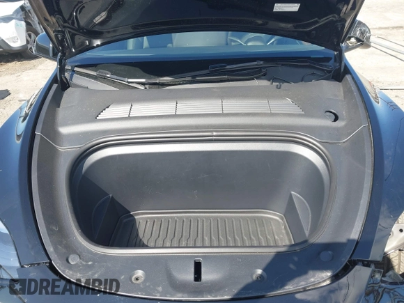 2025 Tesla Model Y Long Range with VIN 7SAYGDEE9SF278607, listed as a IAAI auction lot 41932084 with 9,667 mi miles and . Bid and sale history available at carsss.com. Image 10.