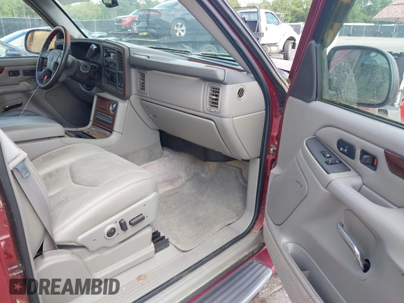 2003 Cadillac Escalade z VIN 1GYEK63N53R183593, wystawiony jako IAAI lot #42438258 z przebiegiem 74 561 mil mil oraz . Historia ofert i sprzedaży dostępna na DreamBid. Obrazek 5.