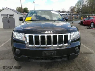 2011 Jeep Grand Cherokee Laredo with VIN 1J4RR4GTXBC538060, listed as a IAAI auction lot 41964694 with 152,999 mi miles. Bid and sale history available at carsss.com. Image 13.