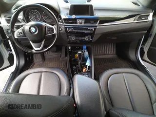 2016 BMW X1 xDrive28i z VIN WBXHT3C3XGP880243, wystawiony jako Copart lot #58436475 z przebiegiem 56 396 mil mil oraz Tytuł czysty. Historia ofert i sprzedaży dostępna na DreamBid. Obrazek 9.