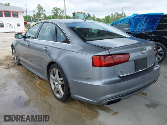 2016 Audi A6 3.0T Premium Plus with VIN WAUFGAFC1GN047352, listed as a IAAI auction lot 41934958 with 111,834 mi miles. Bid and sale history available at carsss.com. Image 3.