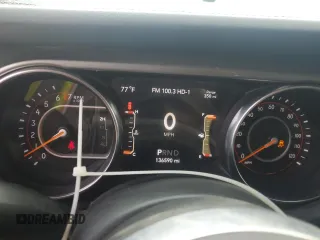 2019 Jeep Wrangler Unlimited Sahara с VIN 1C4HJXEG6KW580031, выставлен на аукционе Copart как лот 59687835 с пробегом 136 590 миль миль и Списание • Salvage title. История ставок и продаж доступна на DreamBid. Изображение 9.
