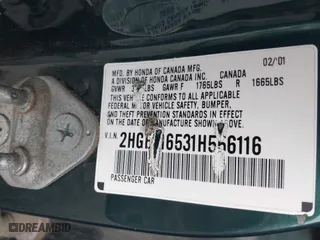 2001 Honda Civic LX with VIN 2HGES16531H556116, listed as a IAAI auction lot 42004307 with 139,074 mi miles. Bid and sale history available at carsss.com. Image 9.