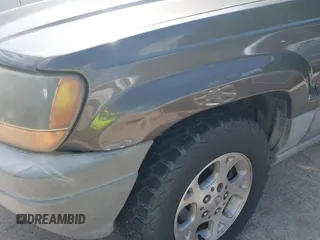 1999 Jeep Grand Cherokee Laredo with VIN 1J4GW58S2XC524365, listed as a IAAI auction lot 42432625 with 284,942 mi miles and . Bid and sale history available at DreamBid. Image 6.