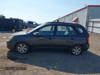 2007 Kia Rondo LX with VIN KNAFG525877075202, listed as a IAAI auction lot 42014611 with 206,496 mi miles. Bid and sale history available at carsss.com. Image 13.