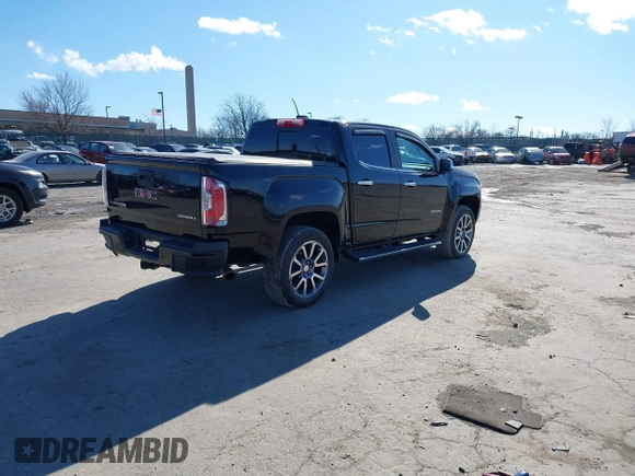 2019 GMC Canyon 4WD Denali with VIN 1GTG6EEN5K1135003, listed as a IAAI auction lot 41599314 with 108,087 mi miles. Bid and sale history available at carsss.com. Image 4.