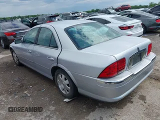 2002 Lincoln LS w/Base Pkg with VIN 1LNHM86S62Y672921, listed as a IAAI auction lot 42100871 with 207,170 mi miles. Bid and sale history available at carsss.com. Image 3.
