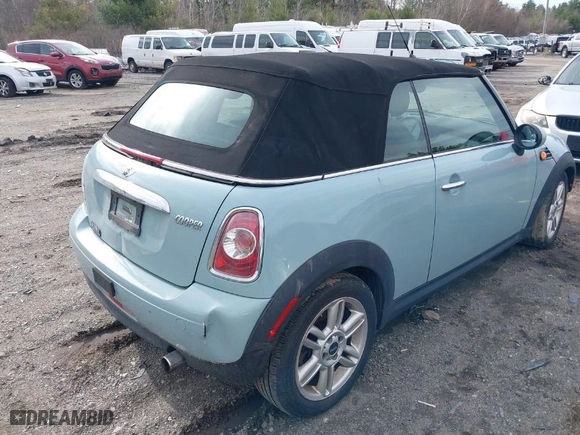 2013 MINI Cooper Convertible with VIN WMWZN3C53DT135427, listed as a IAAI auction lot 41954817 with 57,029 mi miles. Bid and sale history available at carsss.com. Image 4.