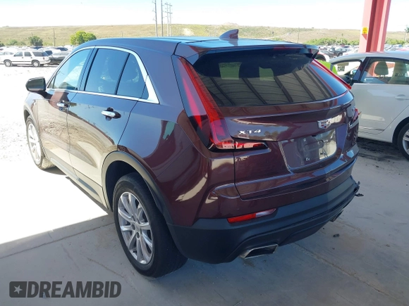 2022 Cadillac XT4 FWD Luxury with VIN 1GYAZAR42NF162880, listed as a IAAI auction lot 41850951 with 47,344 mi miles and . Bid and sale history available at carsss.com. Image 3.