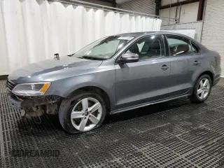 2012 Volkswagen Jetta TDI w/Premium & Nav z VIN 3VWLL7AJ9CM395721, wystawiony jako Copart lot #55604405 z przebiegiem 154 643 mil mil oraz Szkoda całkowita • Salvage title. Historia ofert i sprzedaży dostępna na DreamBid. Obrazek 1.