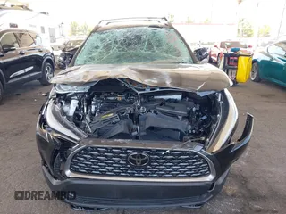 2023 Toyota Corolla Cross XLE with VIN 7MUDAAAG8PV072030, listed as a IAAI auction lot 42397573 with 6,584 mi miles and . Bid and sale history available at DreamBid. Image 6.
