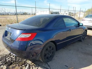 2009 Honda Civic Cpe LX with VIN 2HGFG12679H508263, listed as a IAAI auction lot 41498344 with 128,876 mi miles. Bid and sale history available at carsss.com. Image 4.