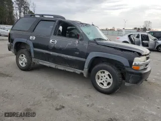 2003 Chevrolet Tahoe Z71 with VIN 1GNEK13T03R124255, listed as a Copart auction lot 42002945 with 205,965 mi miles and Salvage Title. Bid and sale history available at carsss.com. Image 4.