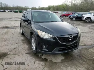2014 Mazda CX-5 Touring with VIN JM3KE2CY8E0424757, listed as a Copart auction lot 54703195 with 111,401 mi miles and Salvage Title. Bid and sale history available at DreamBid. Image 14.