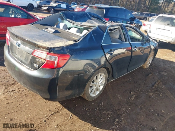 2012 Toyota Camry Hybrid XLE with VIN 4T1BD1FK5CU061039, listed as a IAAI auction lot 41357985 with 76,493 mi miles. Bid and sale history available at carsss.com. Image 4.