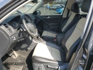 2016 Volkswagen Tiguan S with VIN WVGBV7AX4GW593475, listed as a Copart auction lot 52433155 with 140,356 mi miles and Salvage Title. Bid and sale history available at DreamBid. Image 7.