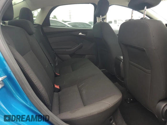 2016 Ford Focus SE z VIN 1FADP3F21GL386580, wystawiony jako Copart lot #63326425 z przebiegiem 82 139 mil mil oraz Szkoda całkowita • Salvage title. Historia ofert i sprzedaży dostępna na DreamBid. Obrazek 10.