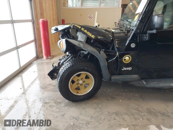 2006 Jeep Wrangler Sport with VIN 1J4FA49S96P733712, listed as a IAAI auction lot 41572913 with 93,511 mi miles. Bid and sale history available at carsss.com. Image 19.