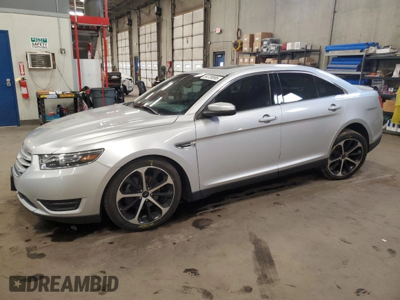 2015 Ford Taurus SEL z VIN 1FAHP2E85FG177576, wystawiony jako Copart lot #54739595 z przebiegiem 89 156 mil mil oraz Szkoda całkowita • Salvage title. Historia ofert i sprzedaży dostępna na DreamBid. Obrazek 1.