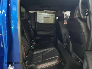 2024 Nissan Frontier SV z VIN 1N6ED1EK5RN615750, wystawiony jako Copart lot #54297595 z przebiegiem 7028 mil mil oraz Szkody całkowita. Historia ofert i sprzedaży dostępna na DreamBid. Obrazek 10.