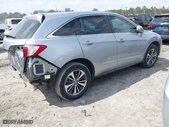 2018 Acura RDX w/Advance Pkg with VIN 5J8TB3H79JL005869, listed as a IAAI auction lot 41785336 with 118,802 mi miles. Bid and sale history available at carsss.com. Image 4.