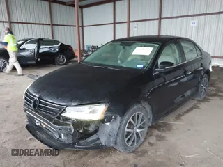 2018 Volkswagen Jetta SE with VIN 3VWDB7AJ3JM214858, listed as a IAAI auction lot 42151137 with 100,346 mi miles and . Bid and sale history available at DreamBid. Image 2.