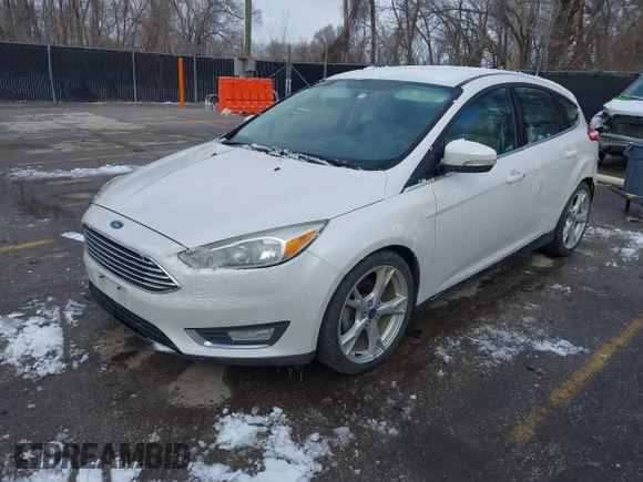 2015 Ford Focus Titanium с VIN 1FADP3N26FL232639, выставлен на аукционе IAAI как лот 41699403 с пробегом 86 870 миль миль и . История ставок и продаж доступна на DreamBid. Изображение 2.