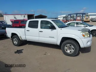 2005 Toyota Tacoma PreRunner with VIN 3TMKU72N65M001821, listed as a IAAI auction lot 41579911 with 301,297 mi miles. Bid and sale history available at carsss.com. Image 12.
