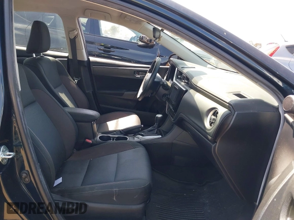 2019 Toyota Corolla L with VIN 2T1BURHE6KC185004, listed as a IAAI auction lot 42105629 with 111,907 mi miles. Bid and sale history available at carsss.com. Image 5.