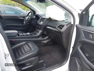 2020 Ford Edge SEL z VIN 2FMPK4J9XLBA07663, wystawiony jako IAAI lot #42115904 z przebiegiem 45 385 mil mil oraz . Historia ofert i sprzedaży dostępna na DreamBid. Obrazek 5.