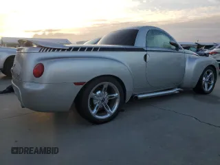 2004 Chevrolet SSR LS z VIN 1GCES14P14B105315, wystawiony jako Copart lot #74983944 z przebiegiem Nie podano mil oraz Szkody całkowita. Historia ofert i sprzedaży dostępna na DreamBid. Obrazek 3.