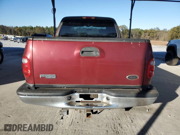 2003 Ford F-150 XL with VIN 1FTRX07L33KB73992, listed as a Copart auction lot 79565774 with 160,545 mi miles and Salvage title. Bid and sale history available at DreamBid. Image 6.