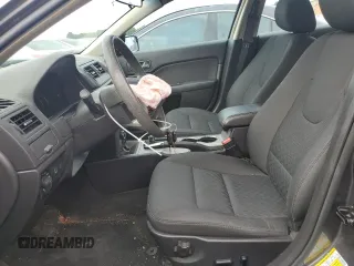 2012 Ford Fusion SE with VIN 3FAHP0HA0CR355529, listed as a Copart auction lot 62585515 with 113,094 mi miles and Salvage title. Bid and sale history available at DreamBid. Image 7.