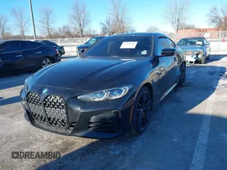 2021 BMW 4 Series M440i xDrive with VIN WBA13AR0XMCF50380, listed as a IAAI auction lot 41200404 with 26,102 mi miles and . Bid and sale history available at DreamBid. Image 2.
