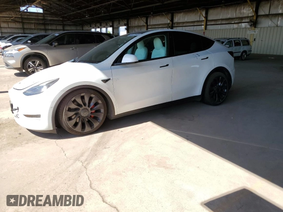 2022 Tesla Model Y Performance z VIN 7SAYGDEF0NF337959, wystawiony jako Copart lot #56871985 z przebiegiem 54 527 mil mil oraz Szkoda całkowita • Salvage title. Historia ofert i sprzedaży dostępna na DreamBid. Obrazek 1.